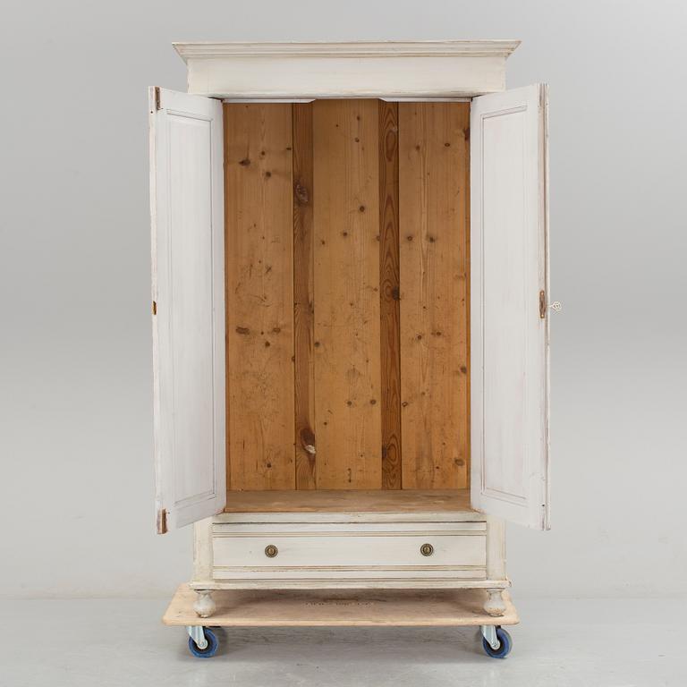 A wardrobe, circa 1900.