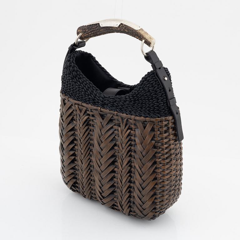 Yves Saint Laurent, a rattan and horn handbag.