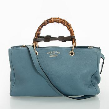 Gucci, a 'Bamboo shopper' bag.