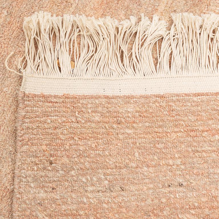 A Chinese carpet, c. 330 x 270 cm.