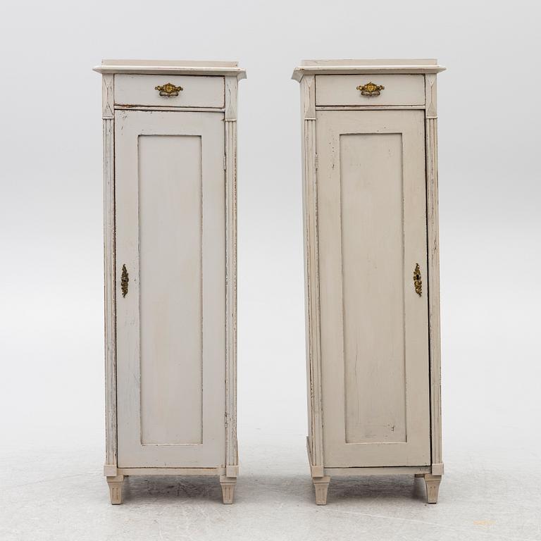 A pair of column cabinets, circa 1900.