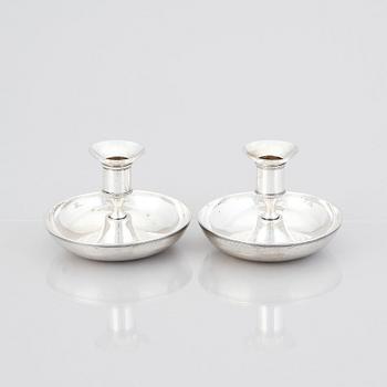 A pair of Swedish early 19th century silver chamber-candlesticks, mark of Adolf Zethelius, Stockholm 1816.