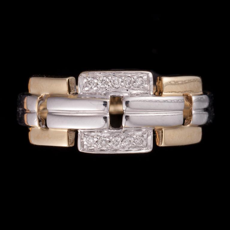 RING, 14K vitguld/gulguld, små diamanter tot. 0,06 ct. Stämplad med Stockmann logo. Vikt 3,9 g.