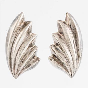 Earrings, silver, in the form of stylised leaves.