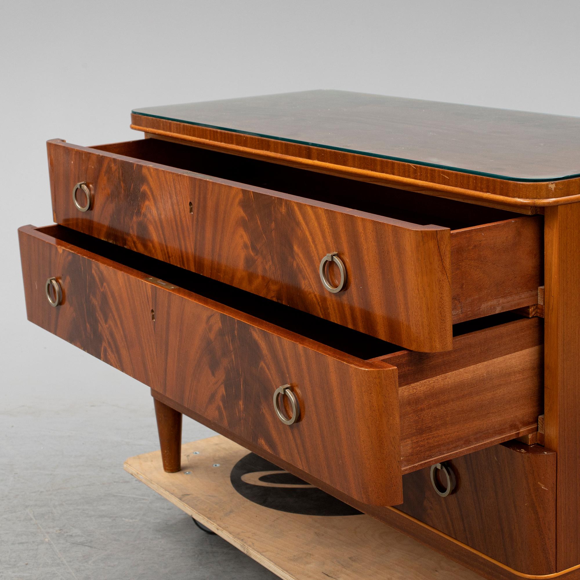 A chest of drawers, mid 20th century.
