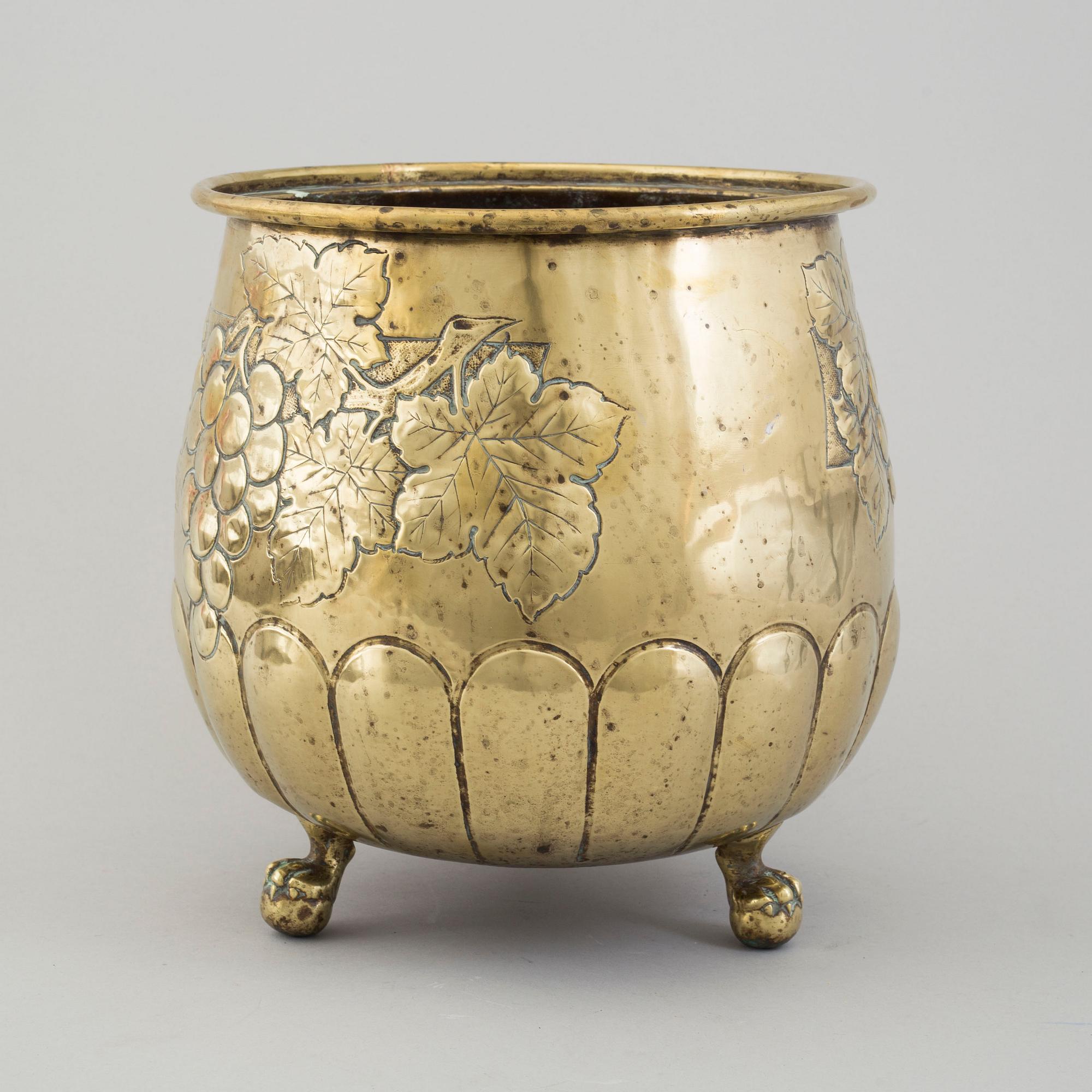 A 19th century brass flower pot.