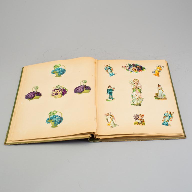 An early 20th century album with paper bookmarks.