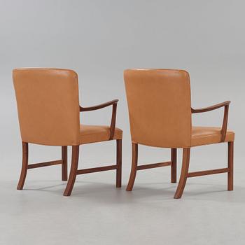 A pair of Ole Wanscher palisander armchairs, Denmark 1960's.