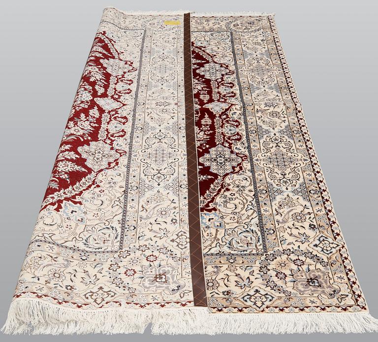 A carpet, Figural Nain, Part silk, S.K 6LAA, 239 x 155 cm.