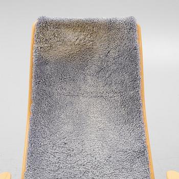 Yngve Ekström, A 'Lamino' easy chair with stool, Swedese, dated -07.