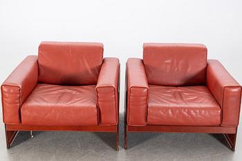 A pair of armchairs by Tito Agnioli for Matteo Grassi, second hal of the 20th century.