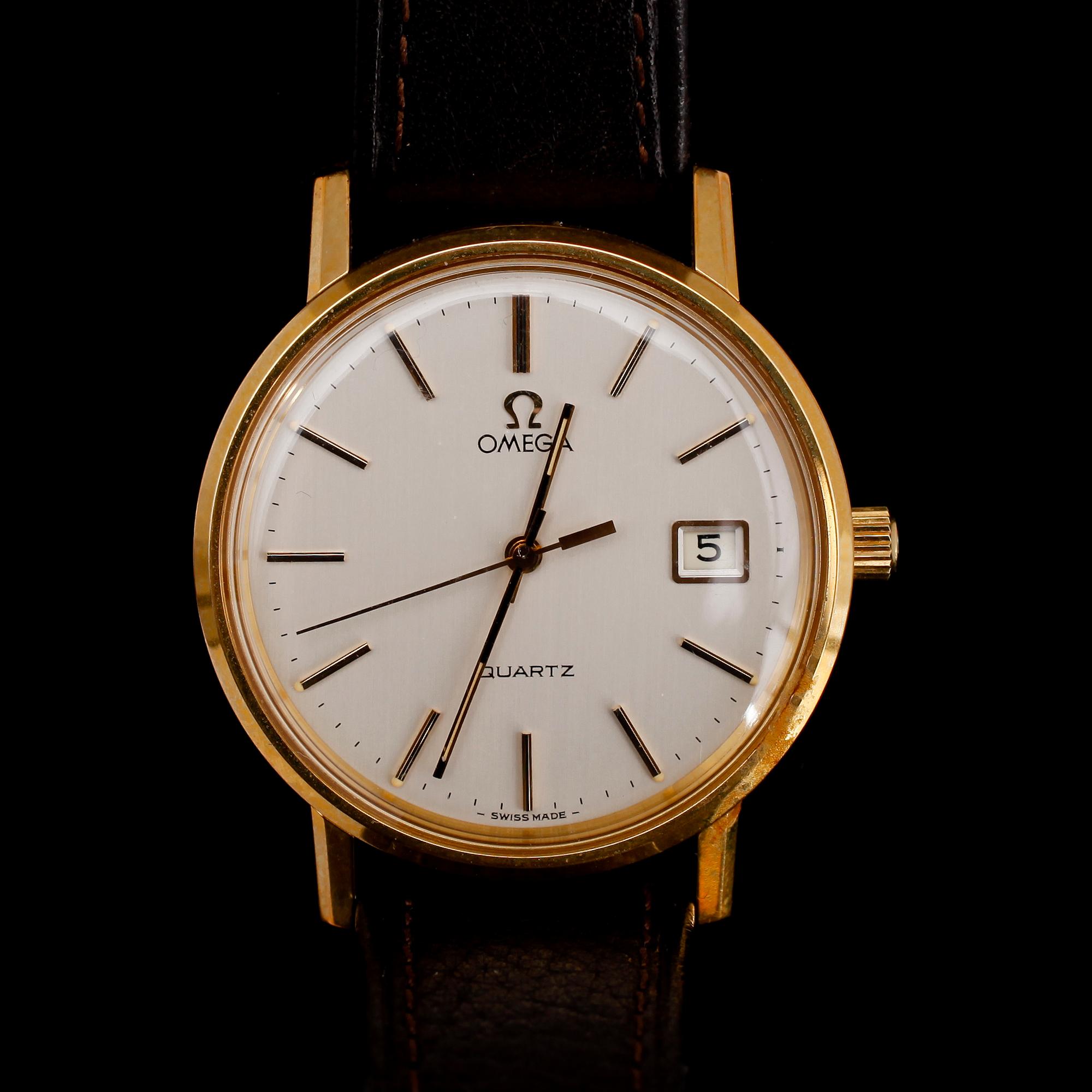 HERRARMBANDSUR, guld på stål, Omega Quartz.