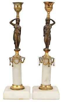 1037. A pair of late Gustavian candlesticks.