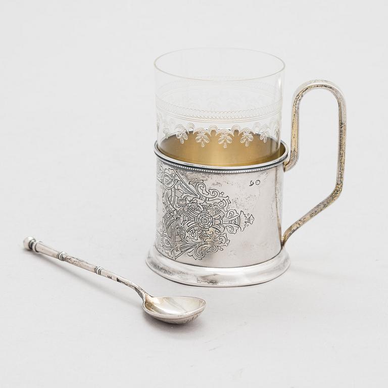 A Russian silver tea glass holder and a tea spoon, Moscow, Alexander Fuld 1889 and Antip Kuzmichev 1888. Glass, Finland.