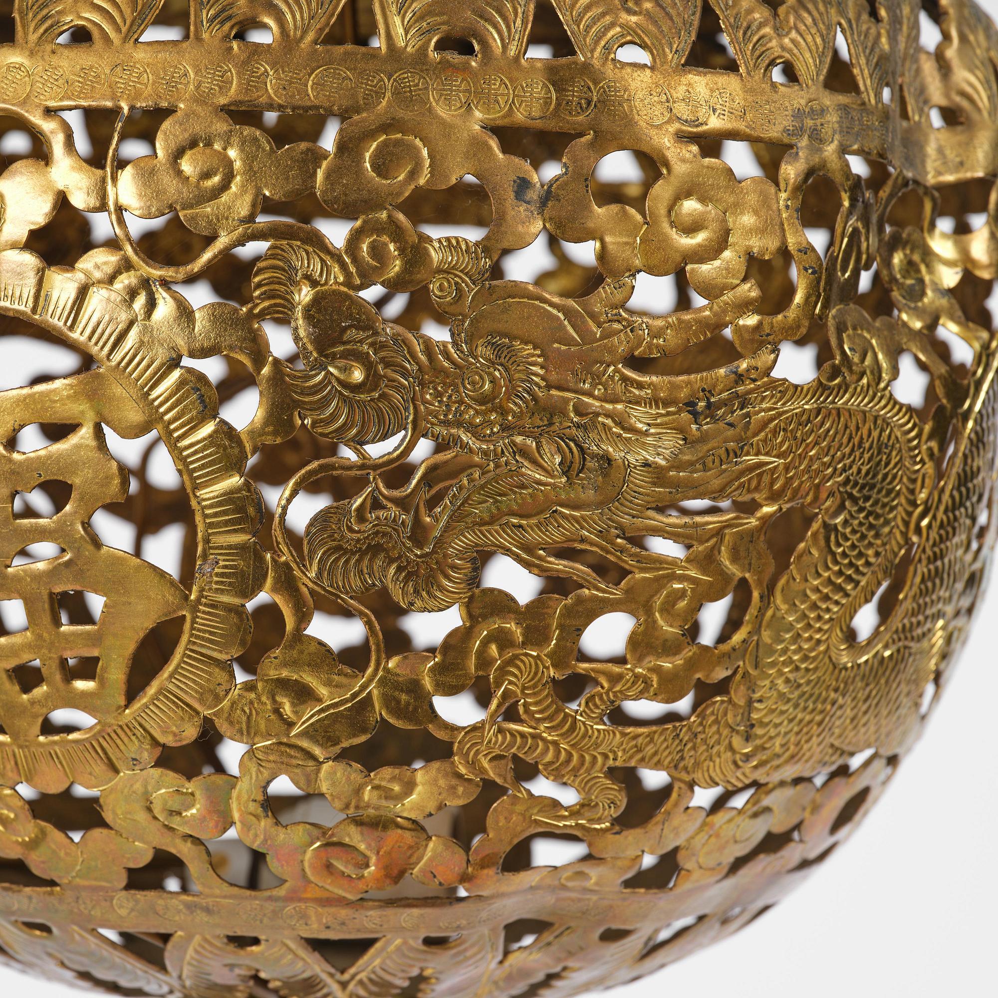 A Chinese gilt wood lantern with brass shade, Qing dynasty, 19th century.