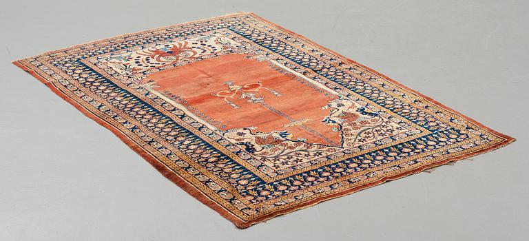 Matto, an antique silk Heriz, ca 166,5-170 cm x 116-120 cm.