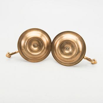 A pair of Gusum brass candelsticks.