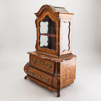 A Louis XV-style miniature cabinet around 1900.