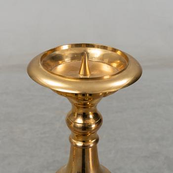 A pair of late 20th century or early 21th century brass altar candlesticks.