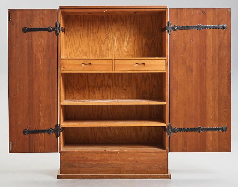 Axel Einar Hjorth, a "Lovö" stained pine cabinet, Nordiska Kompaniet, Sweden, 1930's.