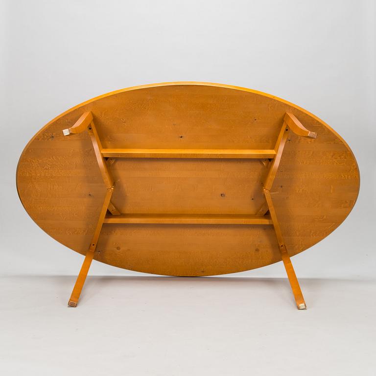 Kimmo Varjoranta, a 9-piece 'Kaiku' dining set retailer  Sope Kaluste. In production 1985-1995.
