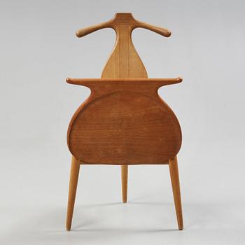 A Hans J Wegner 'Jakkens Hvile' teak chair, Johannes Hansen, Denmark.