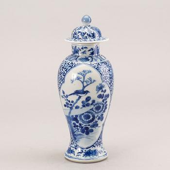 A Chinese 19th century porcelain urn with lid.