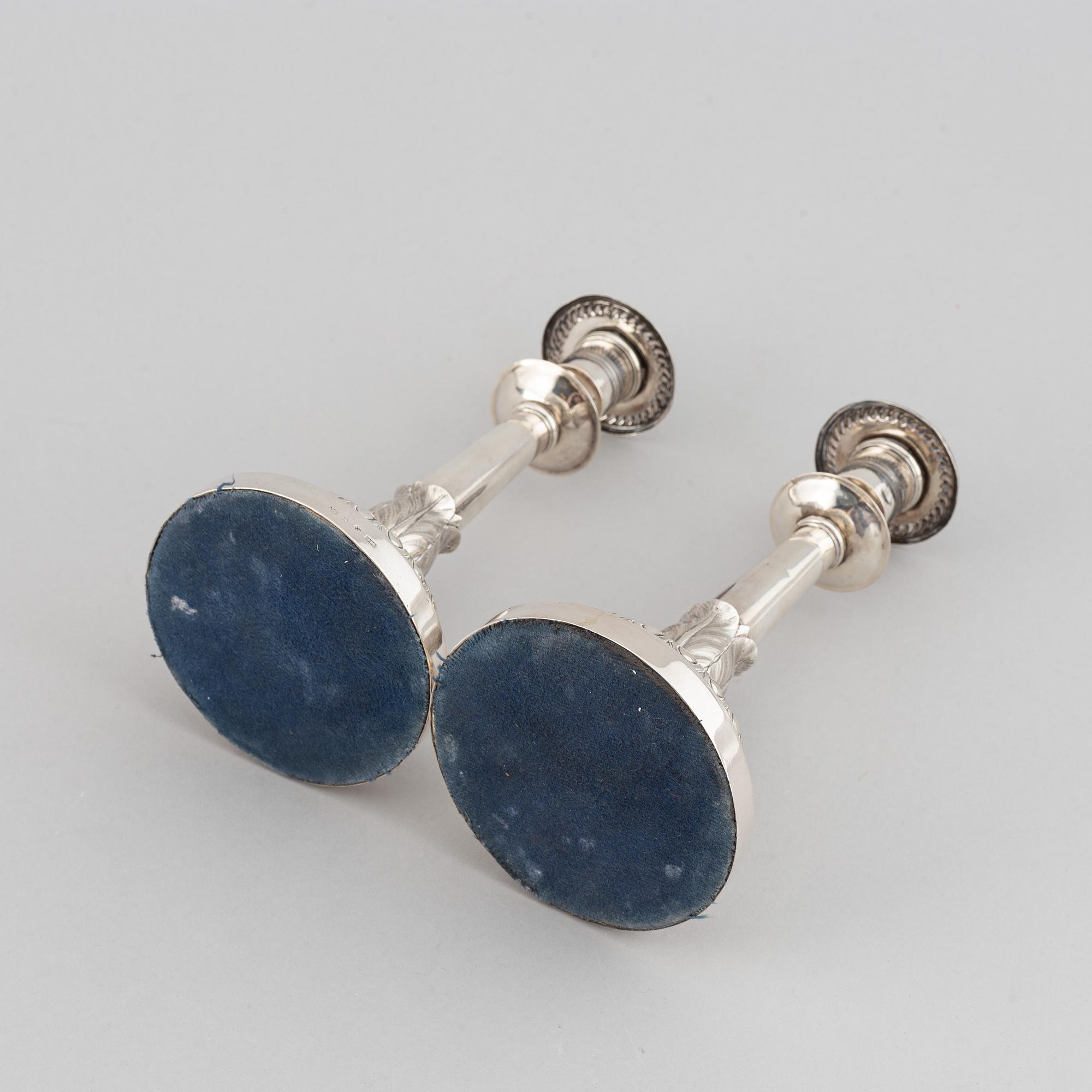 Gustaf Möllenborg, a pair of silver empire candlesticks, Stockholm 1829.