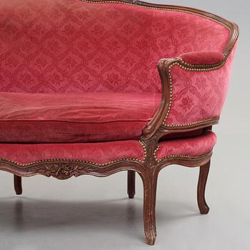 A Louis XV mid 18th century sofa.