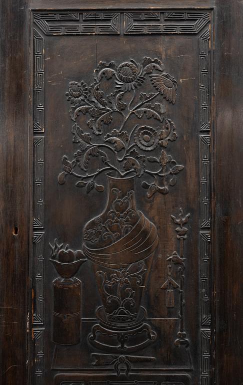 A Chinese wooden panel, Qing dynasty, 19th century.