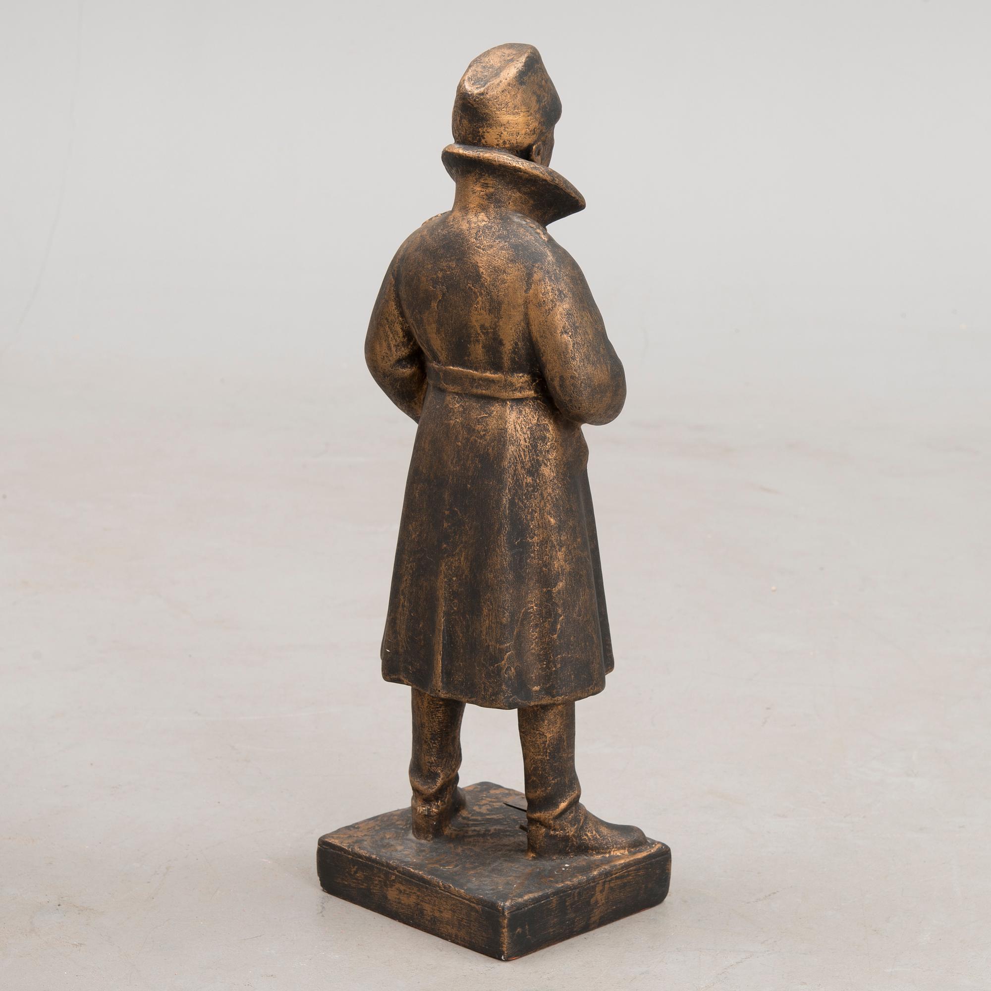patinated plaster, signed and dated 1940.