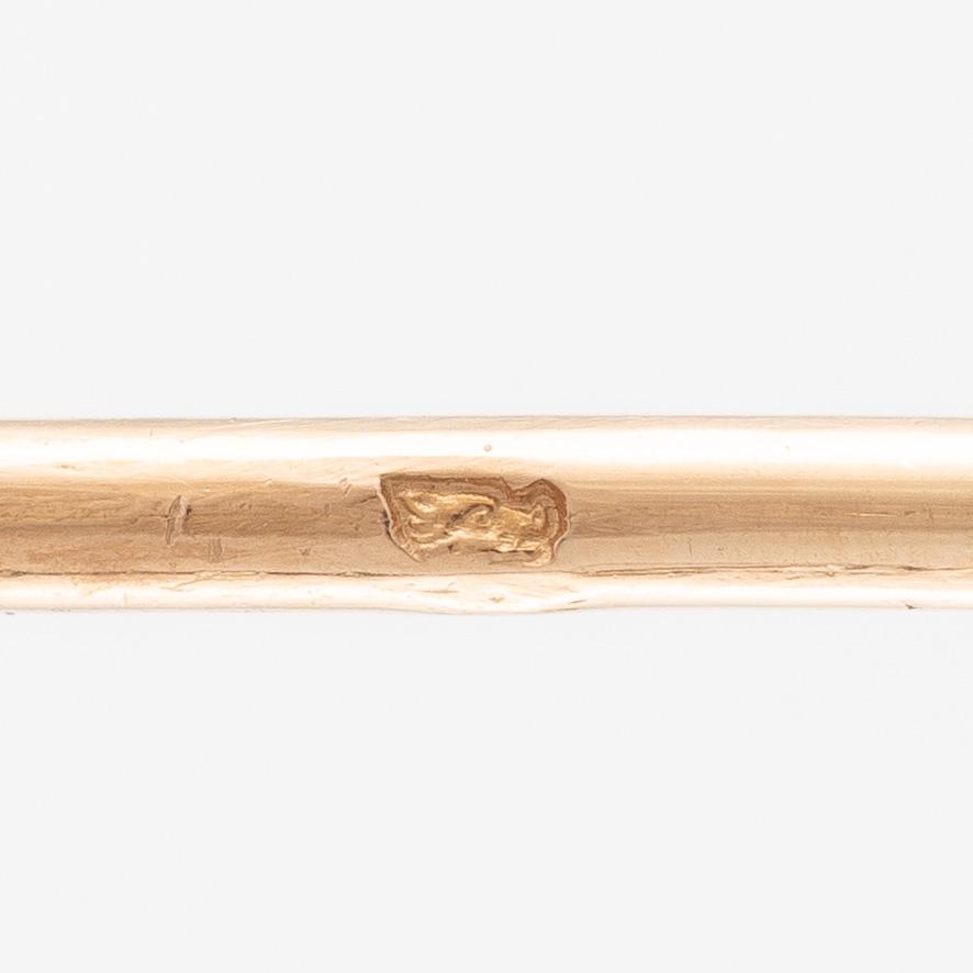 A brooch pin in the form of a beetle, 18K gold and silver with labradorite.