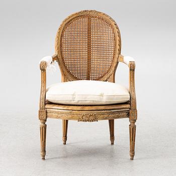 A Louis XVI-style armchair, 19th century.