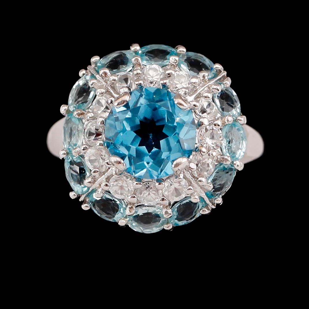 RING, sterlingsilver, blå topaser tot ca 3.00 ct, vita safirer tot ca 1.20 ct, blå turmaliner tot ca 2.40 ct.