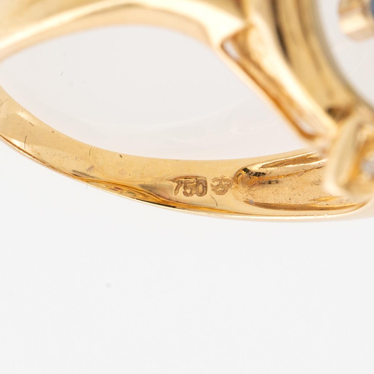 Ring, 18K gold with brilliant-cut diamonds, rubies, emerald, and sapphire.