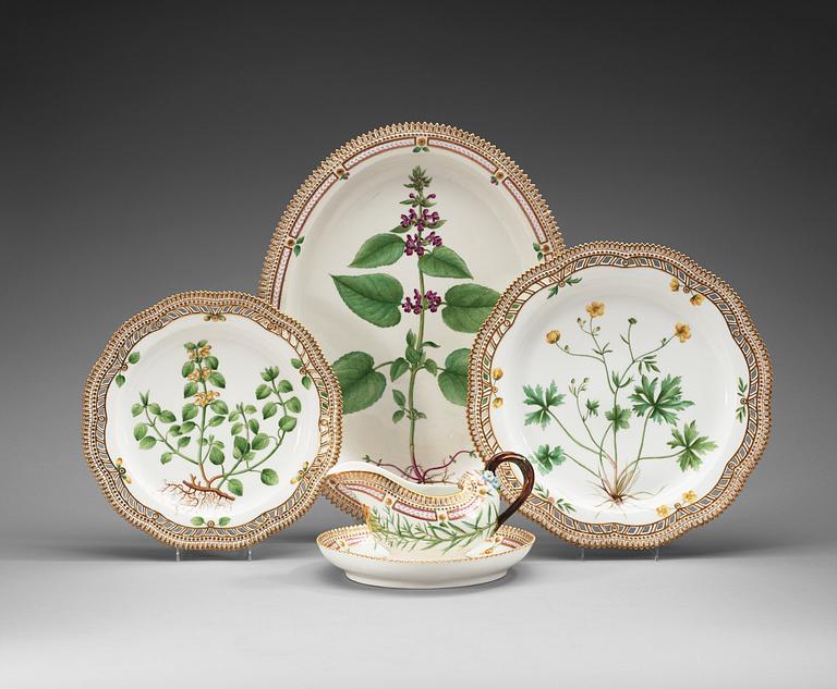 A set of three Royal Copenhagen 'Flora Danica' serving dishes and a sauce boat, Denmark, 20th Century.