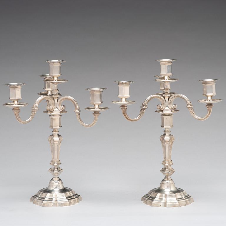 A pair of French 20th century silver 950/1000 four light candelabra, marked Mon Odiot.