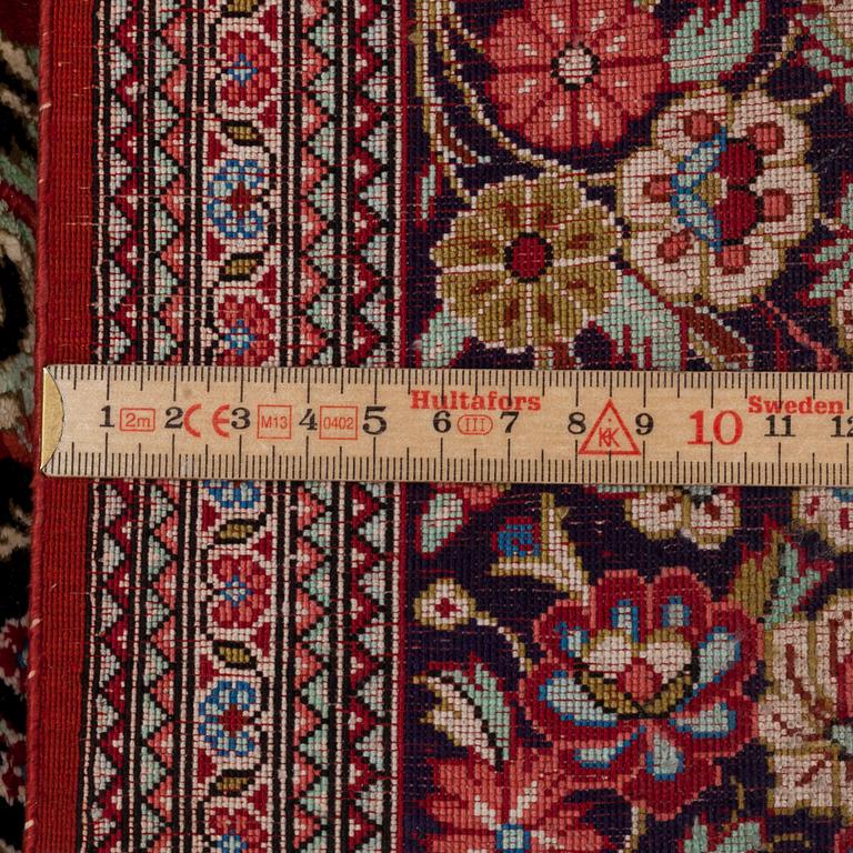 A SILK QUM RUG, around 154 x 101 cm.