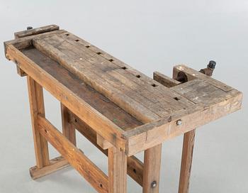 A 20th century wood working bench.