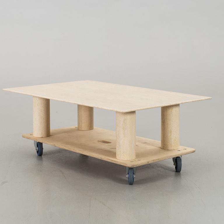 A TRAVERTINE SOFA TABLE.