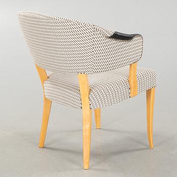 A 21st century"Lata greven" armchair by Carl Malmsten, O.H Sjögren.