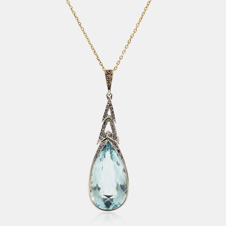 A 14K gold and platinum pendant set with an aquamarine and rose-cut diamonds.