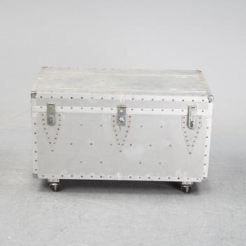 A large metal storage box on wheels, 20th Century.