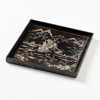 A black lacquer and mother of pearl tray, Qing dynasty, 18th century.