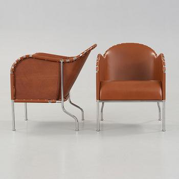 Mats Theselius, A pair of 'Bruno' brown leather and steel easy chairs, Källemo, Sweden.