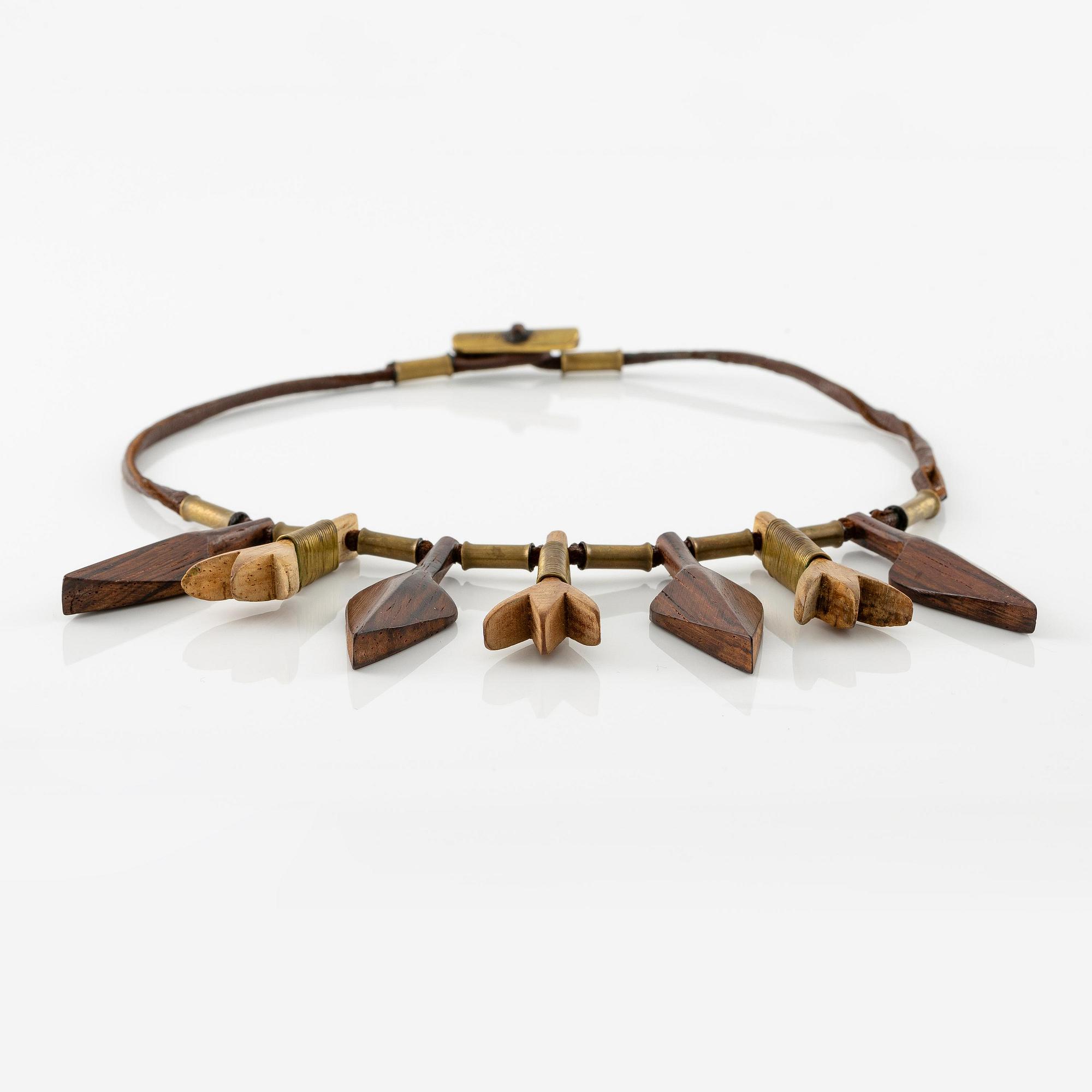 Vivianna Torun Bülow-Hübe, a leather, wood and copper necklace, executed in her workshop ca 1948.
