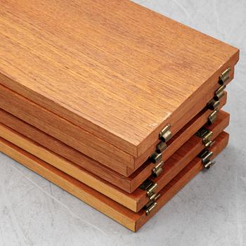 Nils Strinning, a 'String' teak veneer book shelf system.