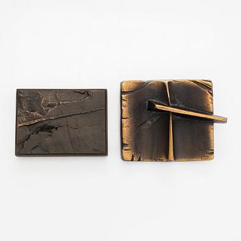 Kimmo Pyykkö, a set of two bronze reliefs.