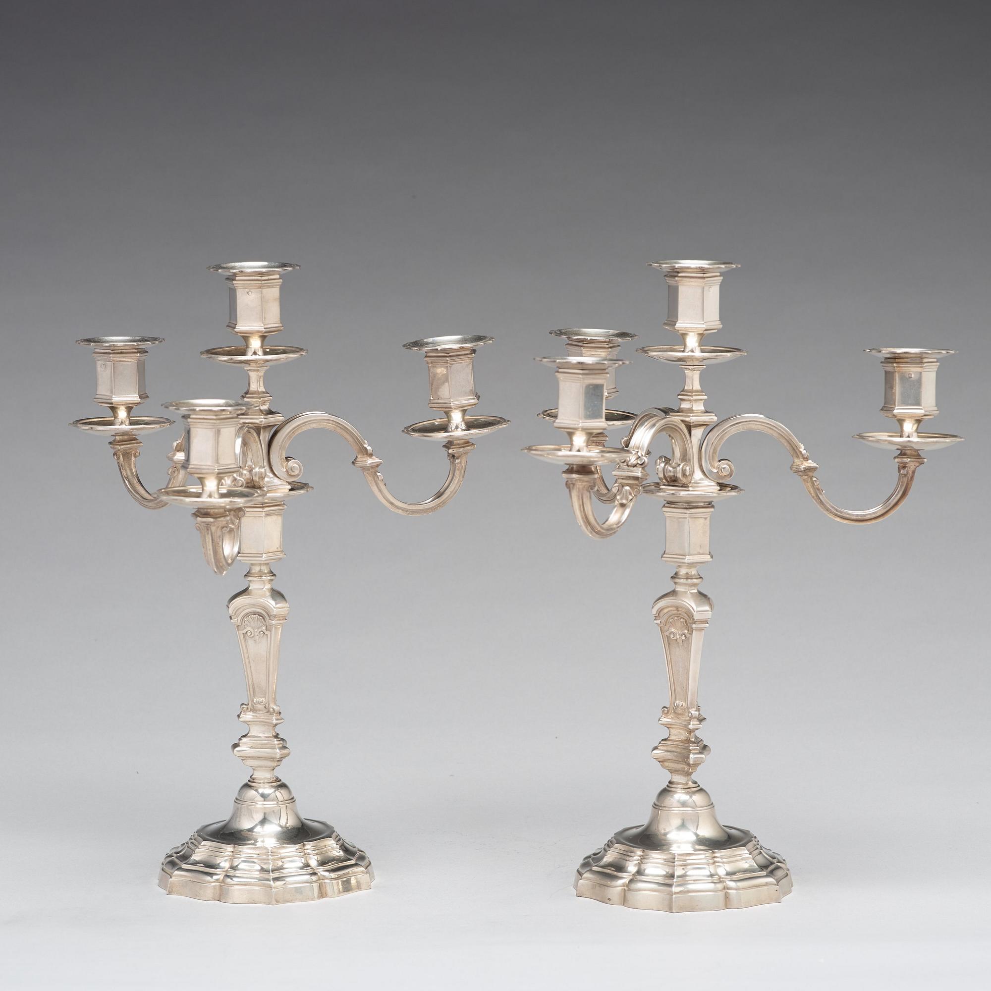 A pair of French 20th century silver 950/1000 four light candelabra, marked Mon Odiot.
