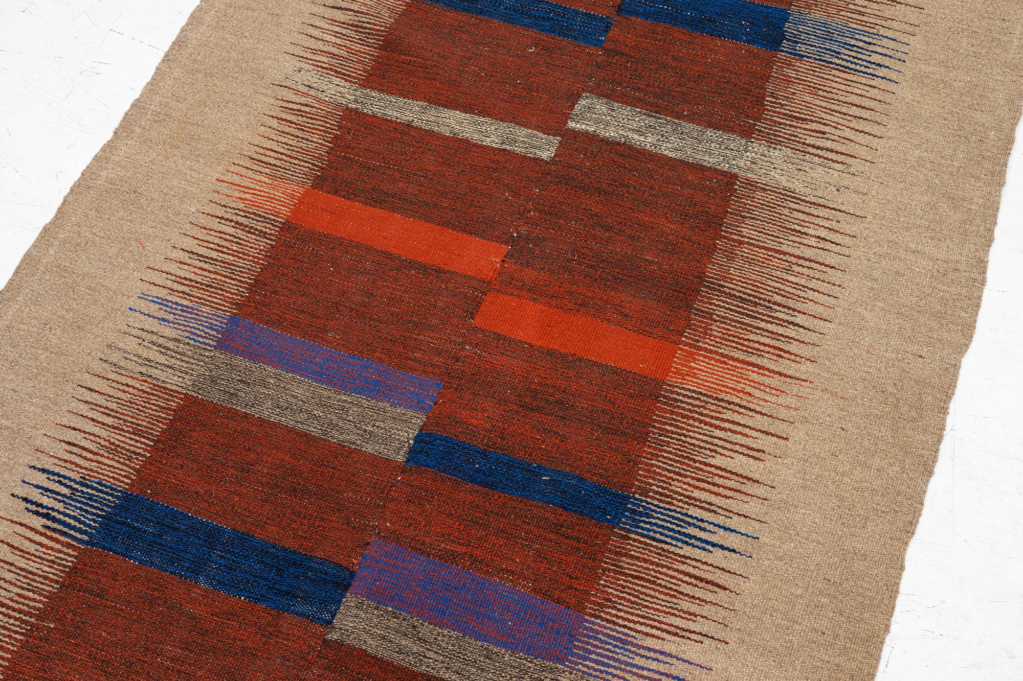 A persian kilim rug, c. 254 x 111 cm.